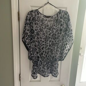 Winged arms elastic at waist size S